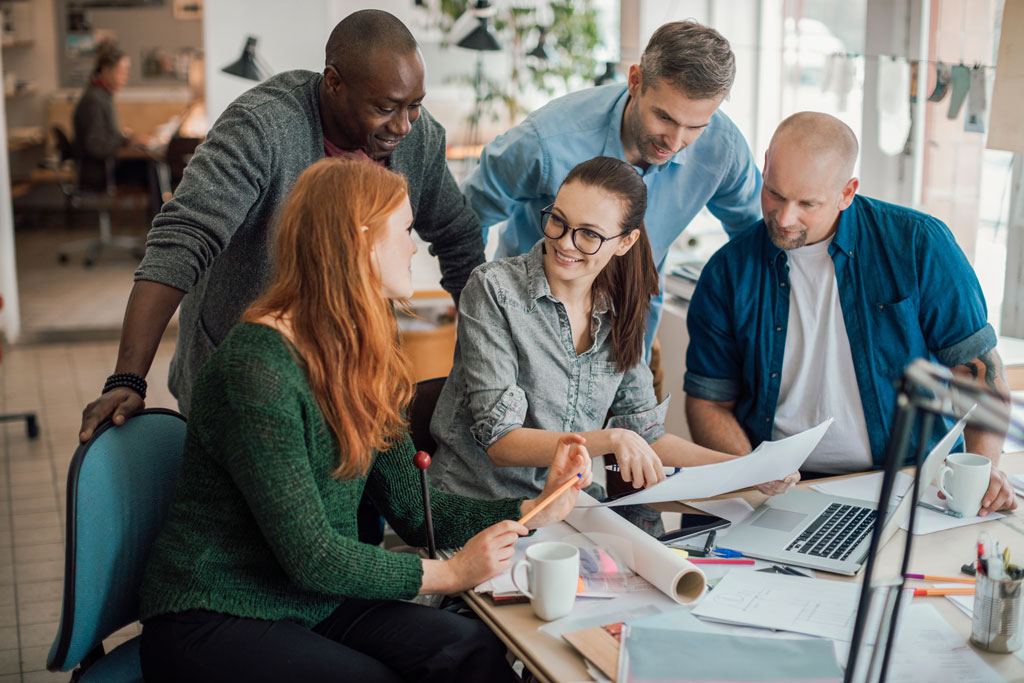 People gathered for a meeting together at work